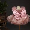 A one-year-old girl wore a pink short butterfly dress, a princess dress and a puffy dress to host a sweet stage performance